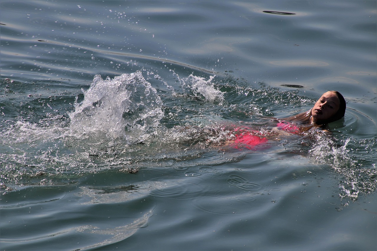 In the water, to swim, swimmer, active recreation, relaxation, she, one, floating, happy, active, bodensee, water, mood, summer, holiday, nature, lake, adventure, blue, people, girl